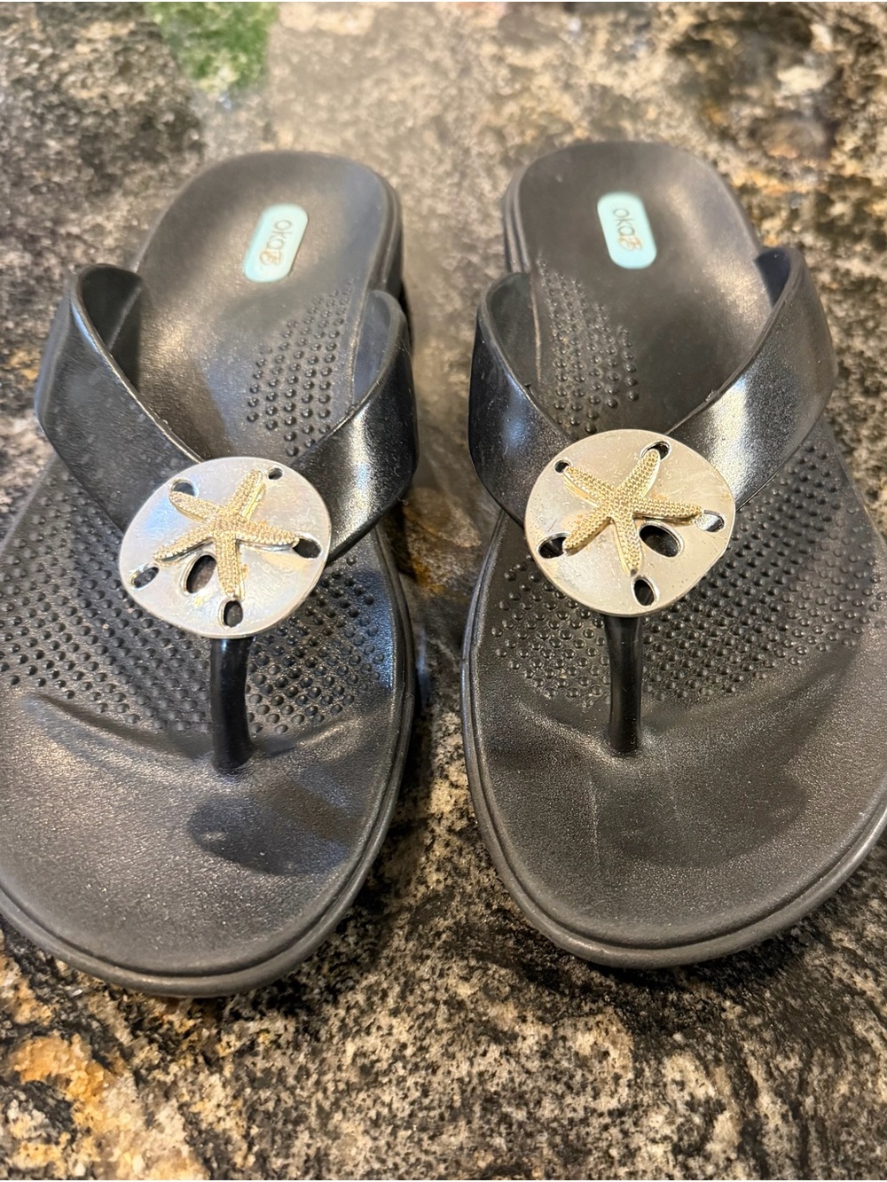 OKA b. Black Thong Sandals with Gold Starfish Medallions